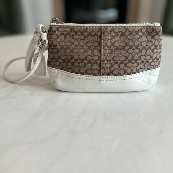 Coach Handbags - Coach Brown Signature Canvas Wristlet with White Leather Trim